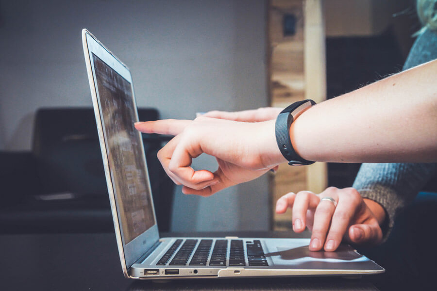 training hands at a computer