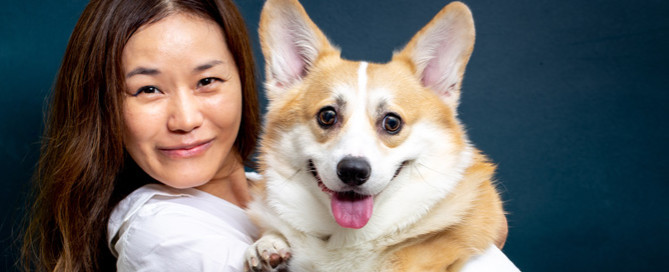 woman holding corgi, Vets play a vital role in both animal and human health, discover how. Plus, get 7 fun veterinary facts to celebrate World Veterinary Day.